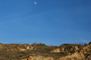 moon over cliff