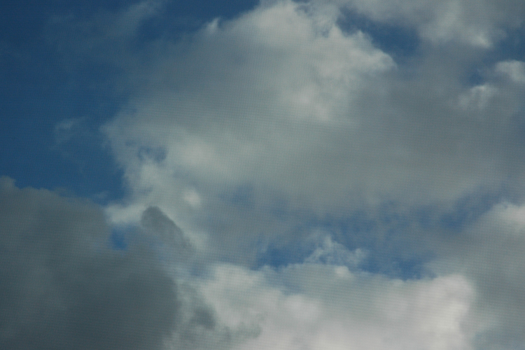 clouds through screen